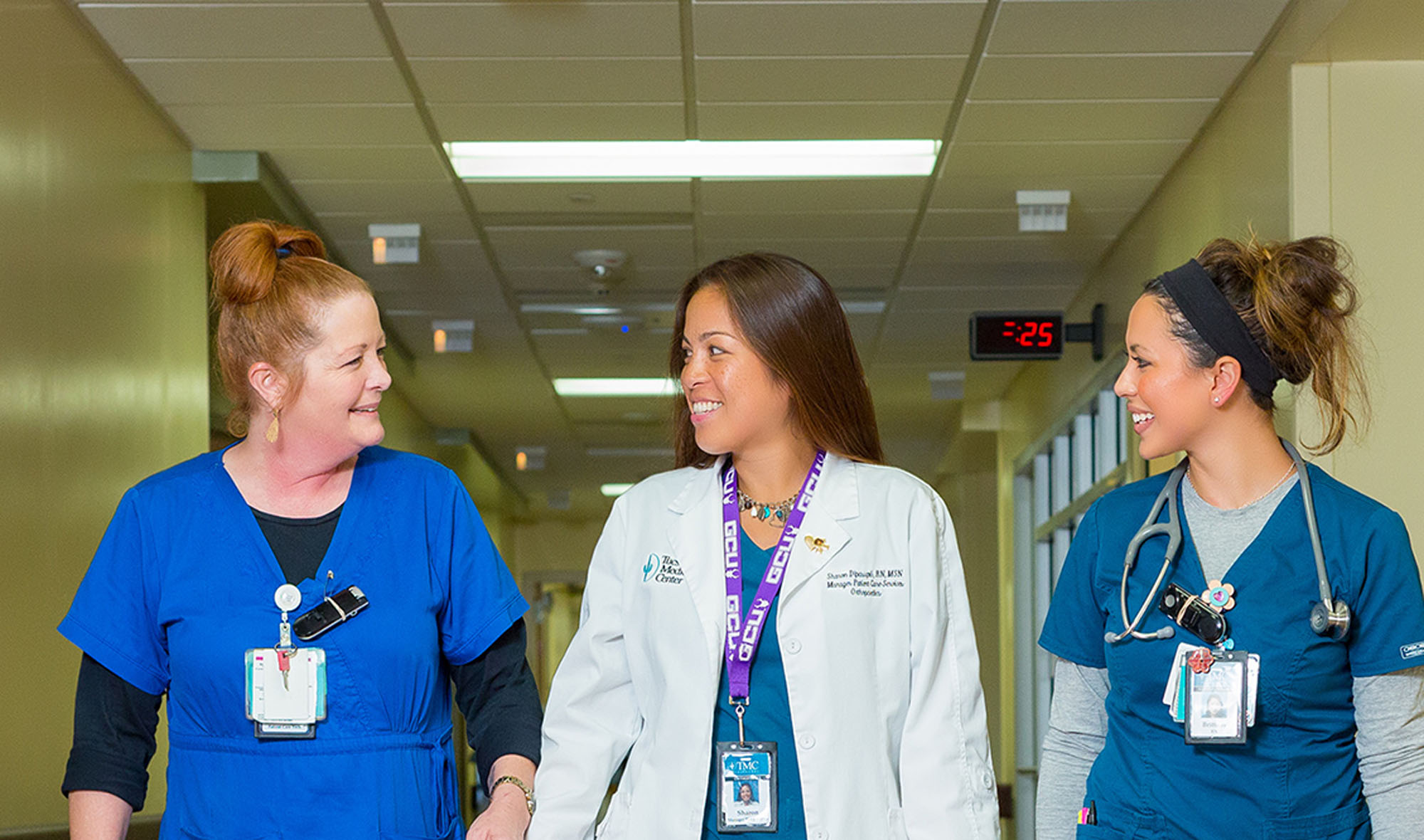 Three women providers walking 